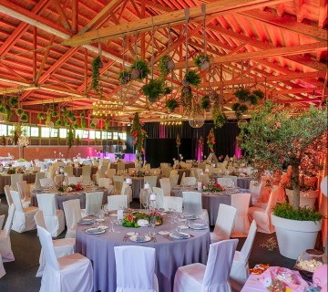 Premises, wedding reception, hall, barn, open space, set round tables, chandeliers