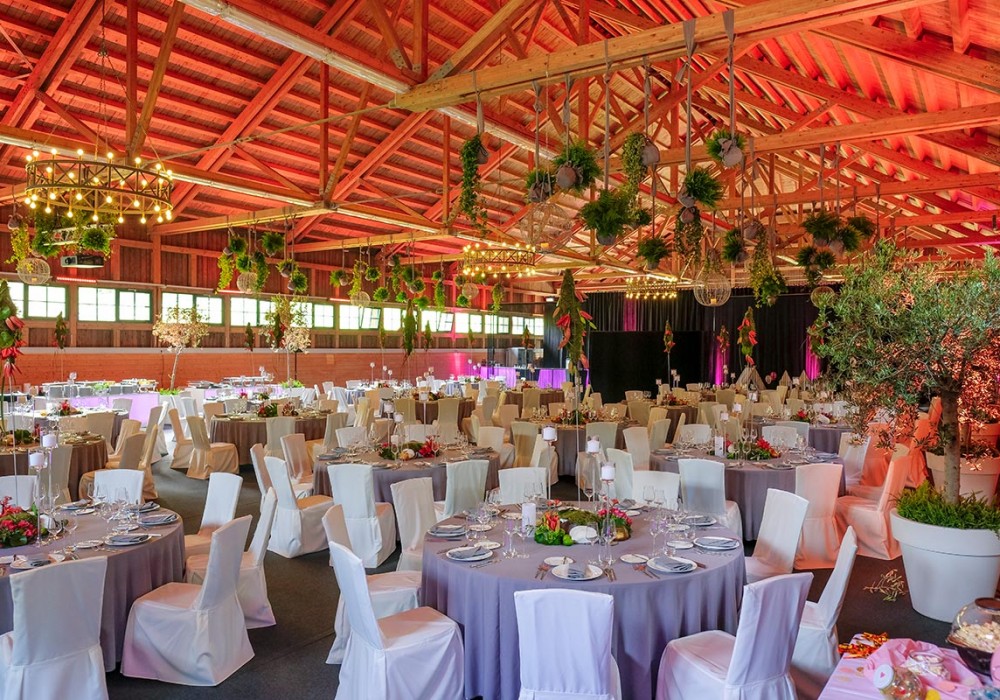 Premises, wedding reception, hall, barn, open space, set round tables, chandeliers